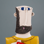 Abstract Bearded Man Sculpture with Red Polka Dot Fish - The Golden Theory