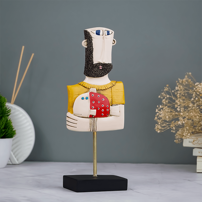 Abstract Bearded Man Sculpture with Red Polka Dot Fish - The Golden Theory Main image