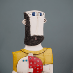 Abstract Bearded Man Sculpture with Red Polka Dot Fish - The Golden Theory