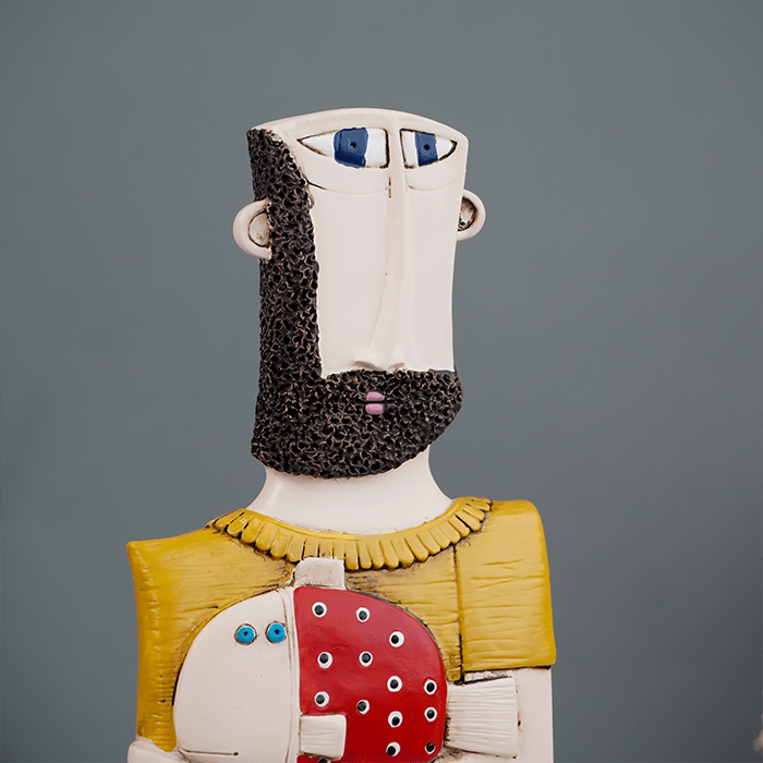 Abstract Bearded Man Sculpture with Red Polka Dot Fish - The Golden Theory