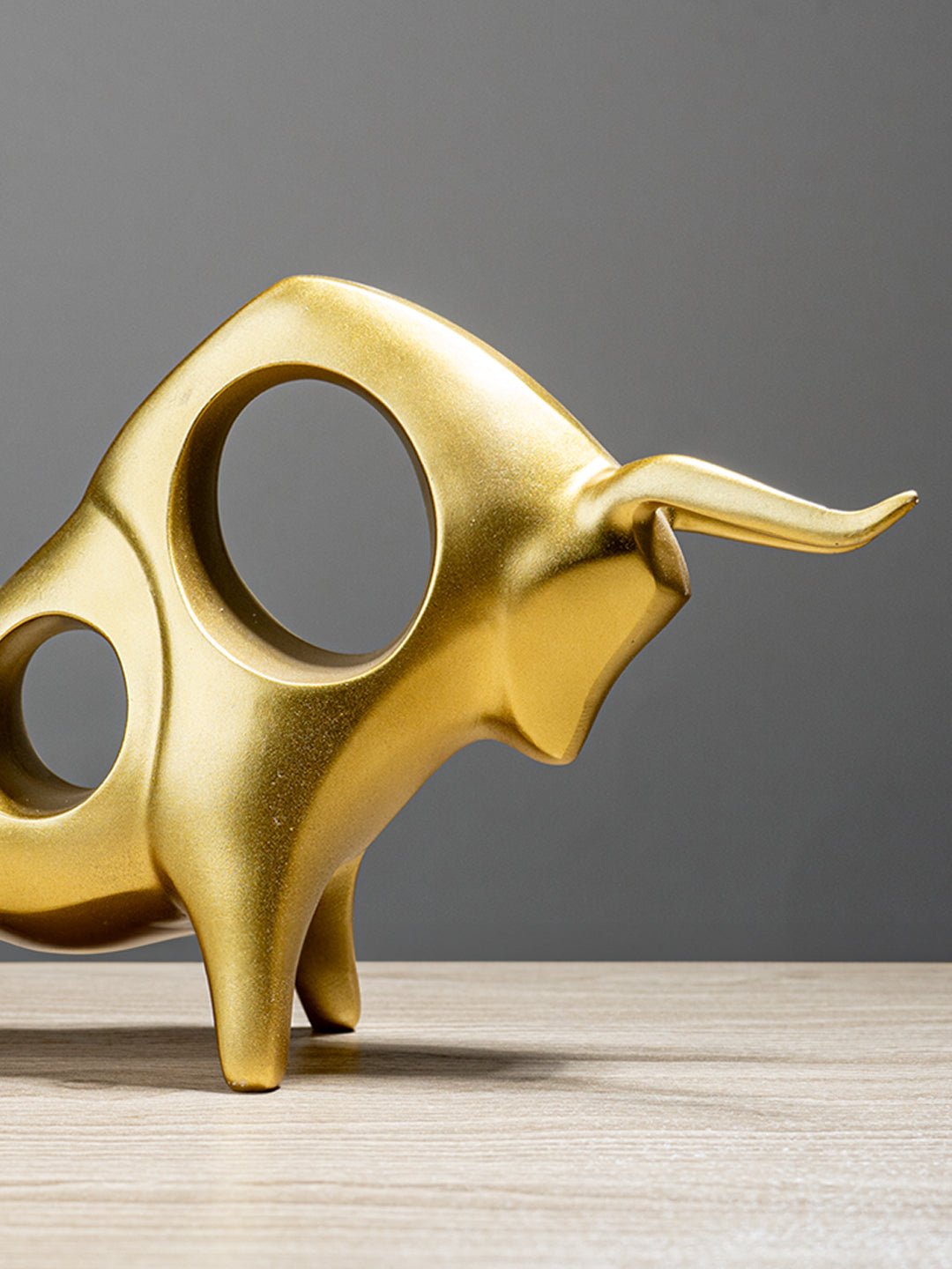 Abstract Bull Sculpture Locking Horns - The Golden Theory