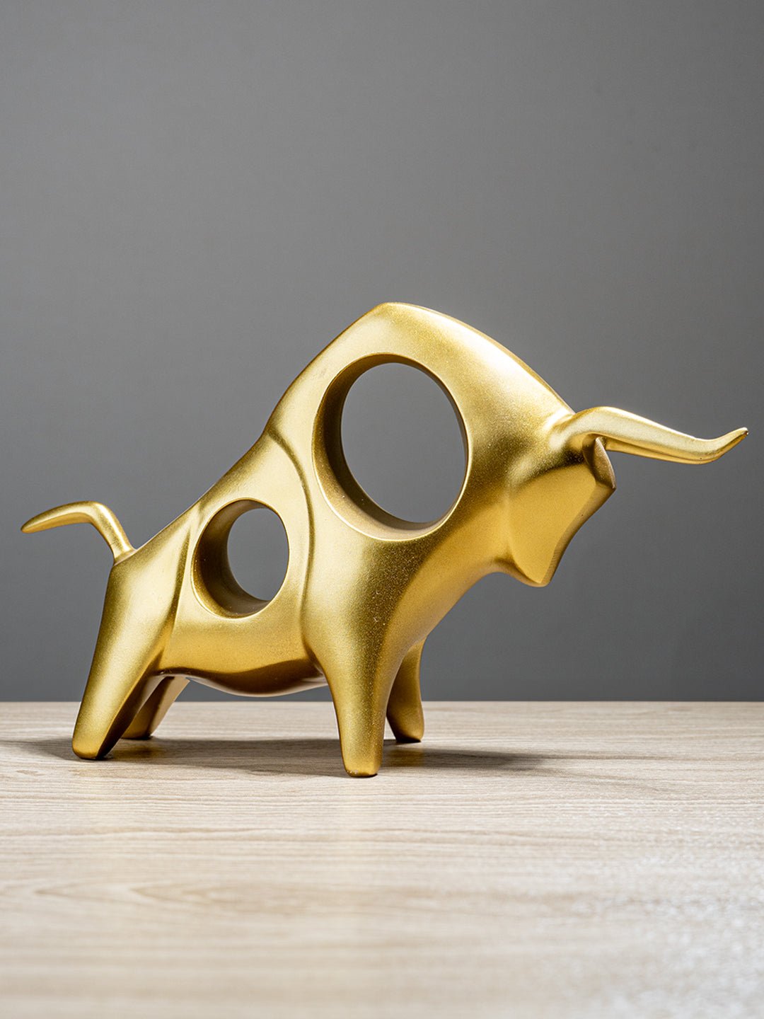 Abstract Bull Sculpture Locking Horns - The Golden Theory Main image
