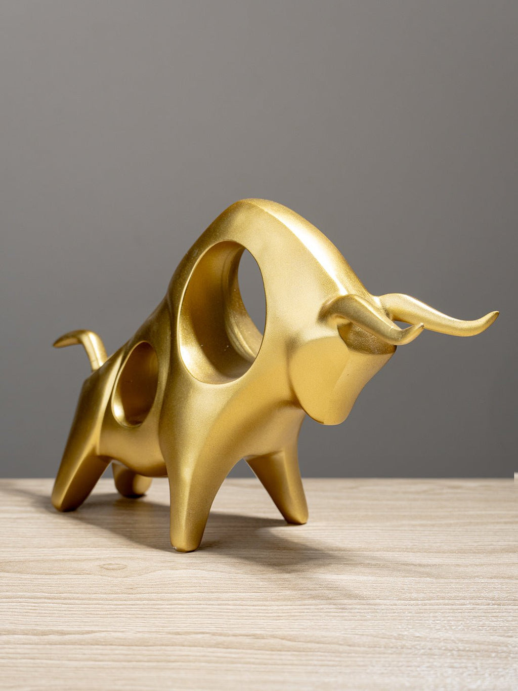 Abstract Bull Sculpture Locking Horns - The Golden Theory