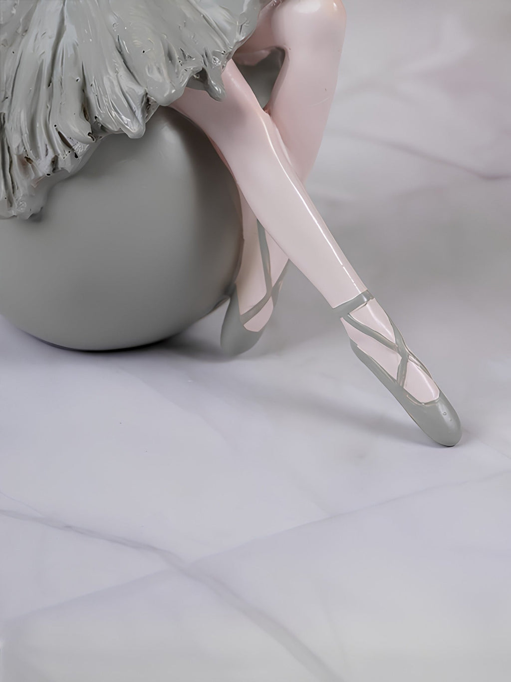 Ballerina Figurine Sitting on Sphere - The Golden Theory