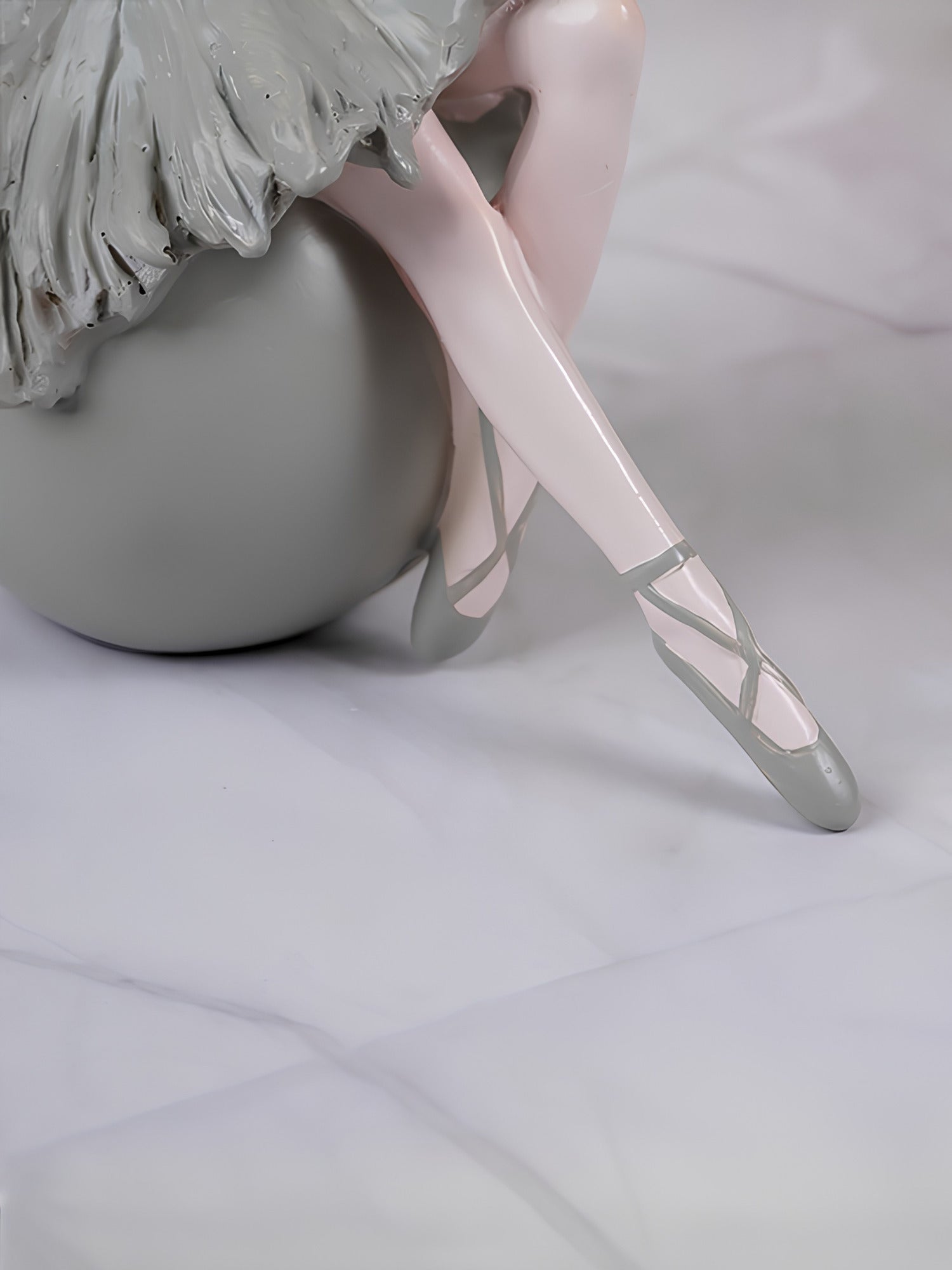 Ballerina Figurine Sitting on Sphere - The Golden Theory