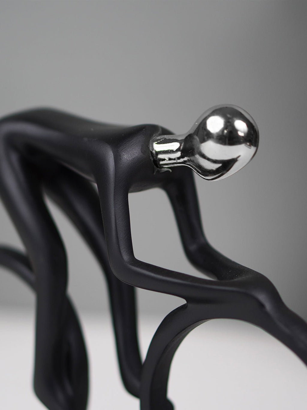 Black and Silver Cyclist Sculpture - The Golden Theory