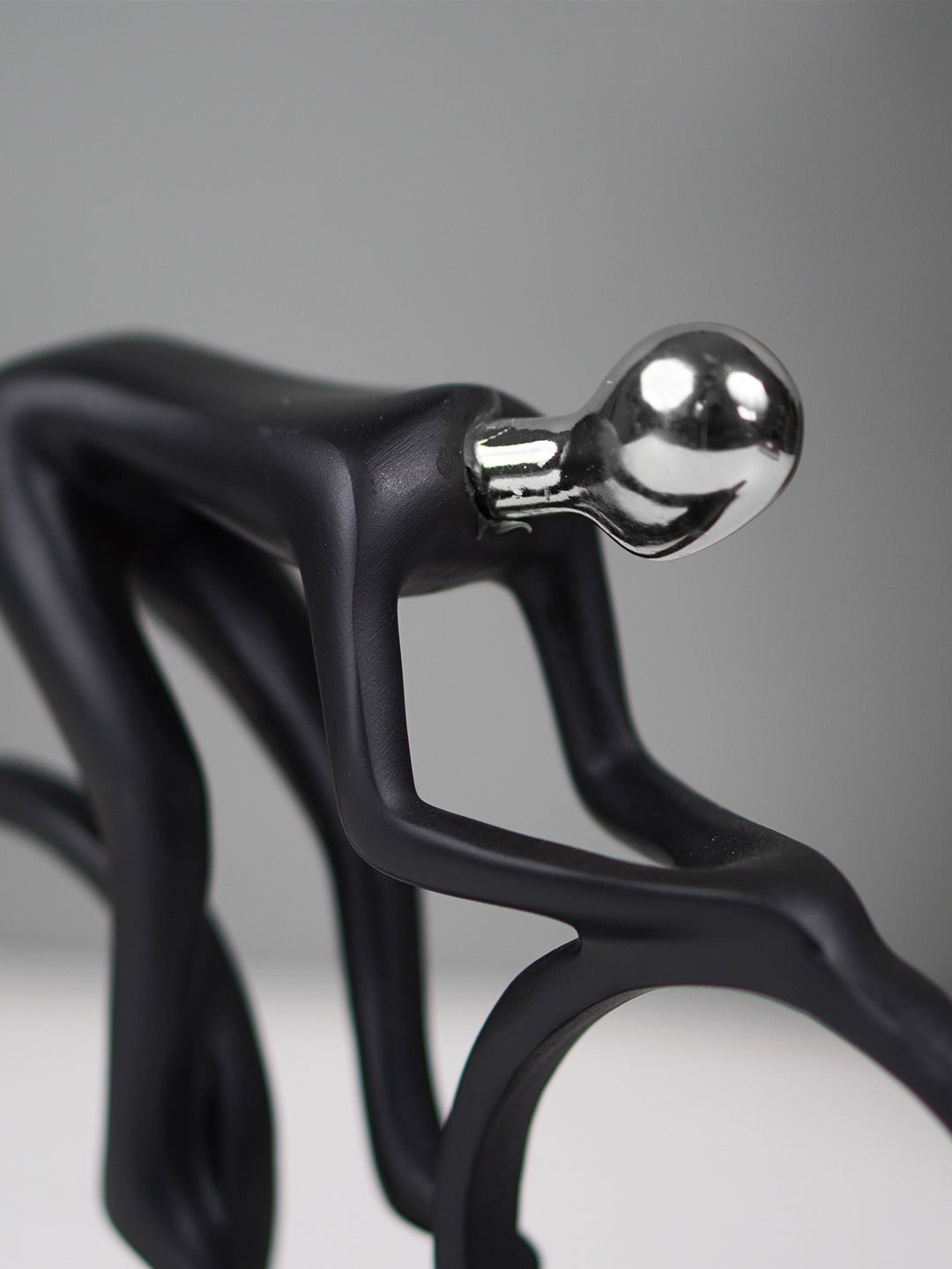 Black and Silver Cyclist Sculpture - The Golden Theory