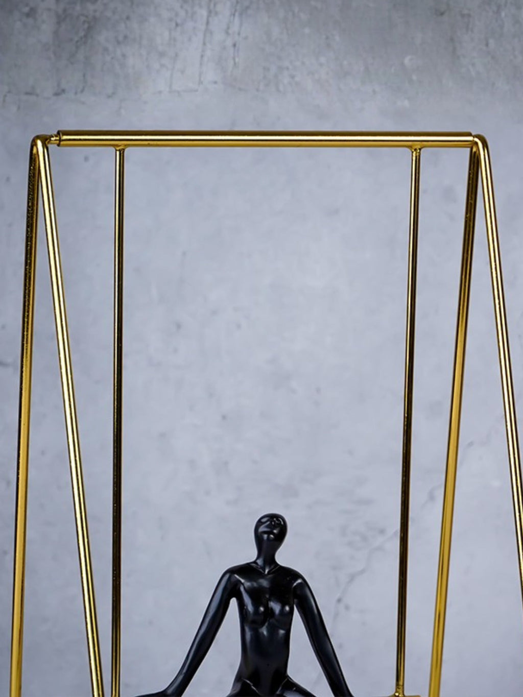 Black Figure on Gold Swing - The Golden Theory