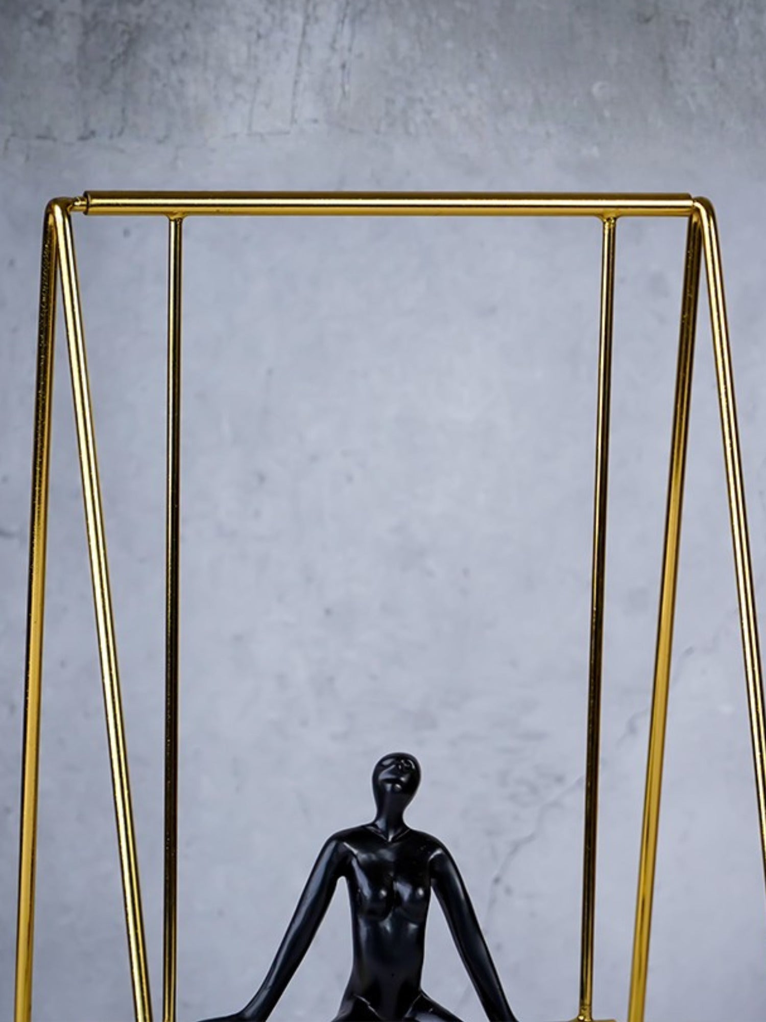 Black Figure on Gold Swing - The Golden Theory