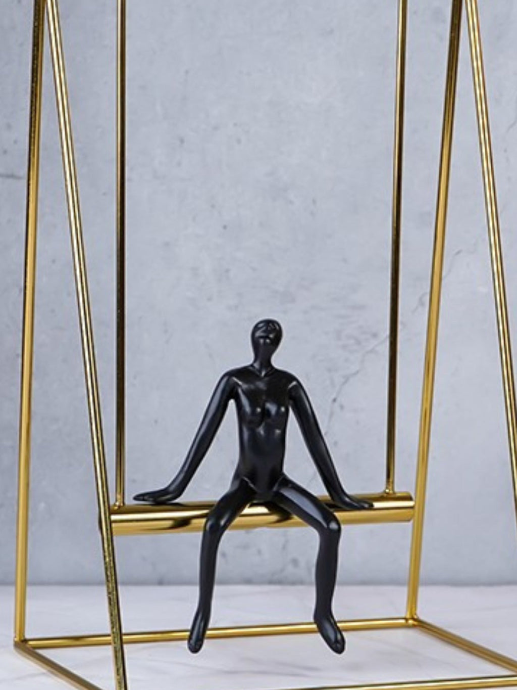Black Figure on Gold Swing - The Golden Theory