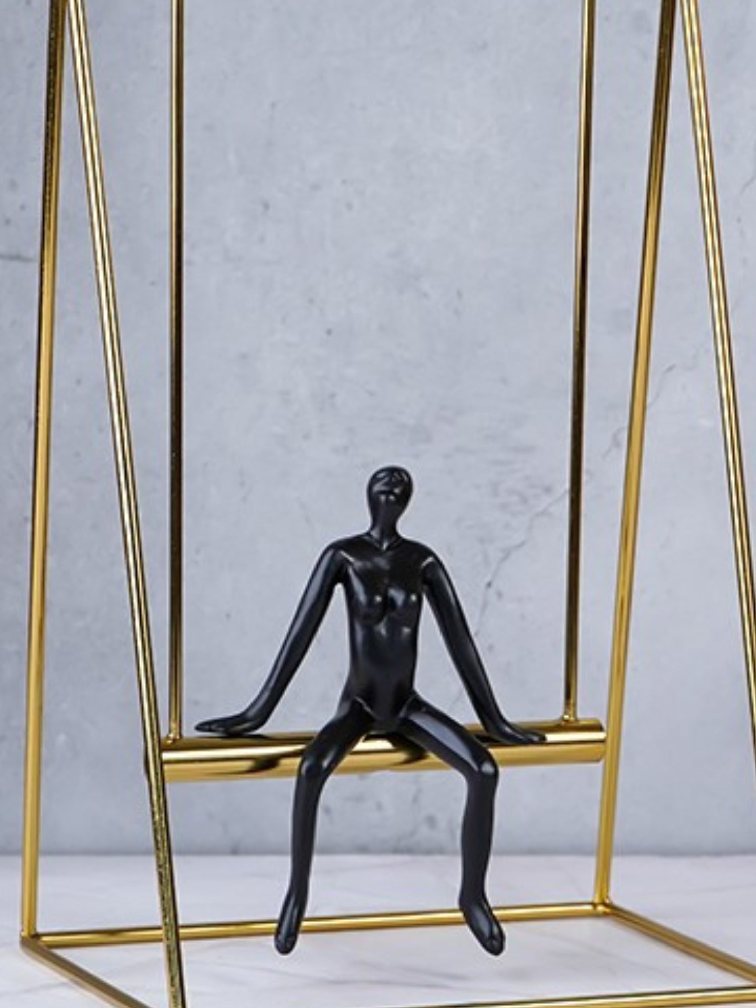 Black Figure on Gold Swing - The Golden Theory