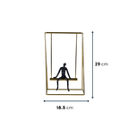 Black Figure on Gold Swing - The Golden Theory
