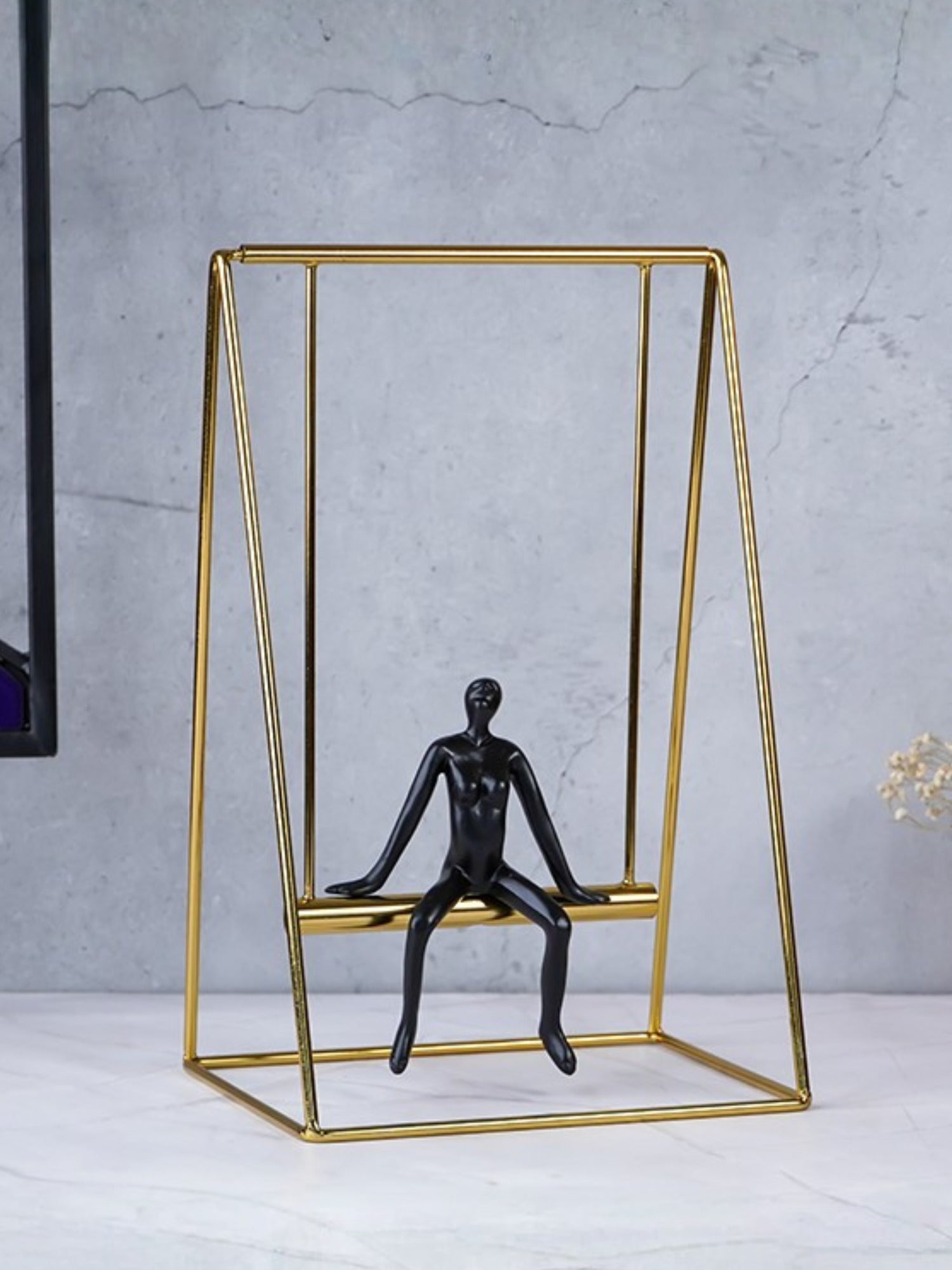 Black Figure on Gold Swing - The Golden Theory Main image