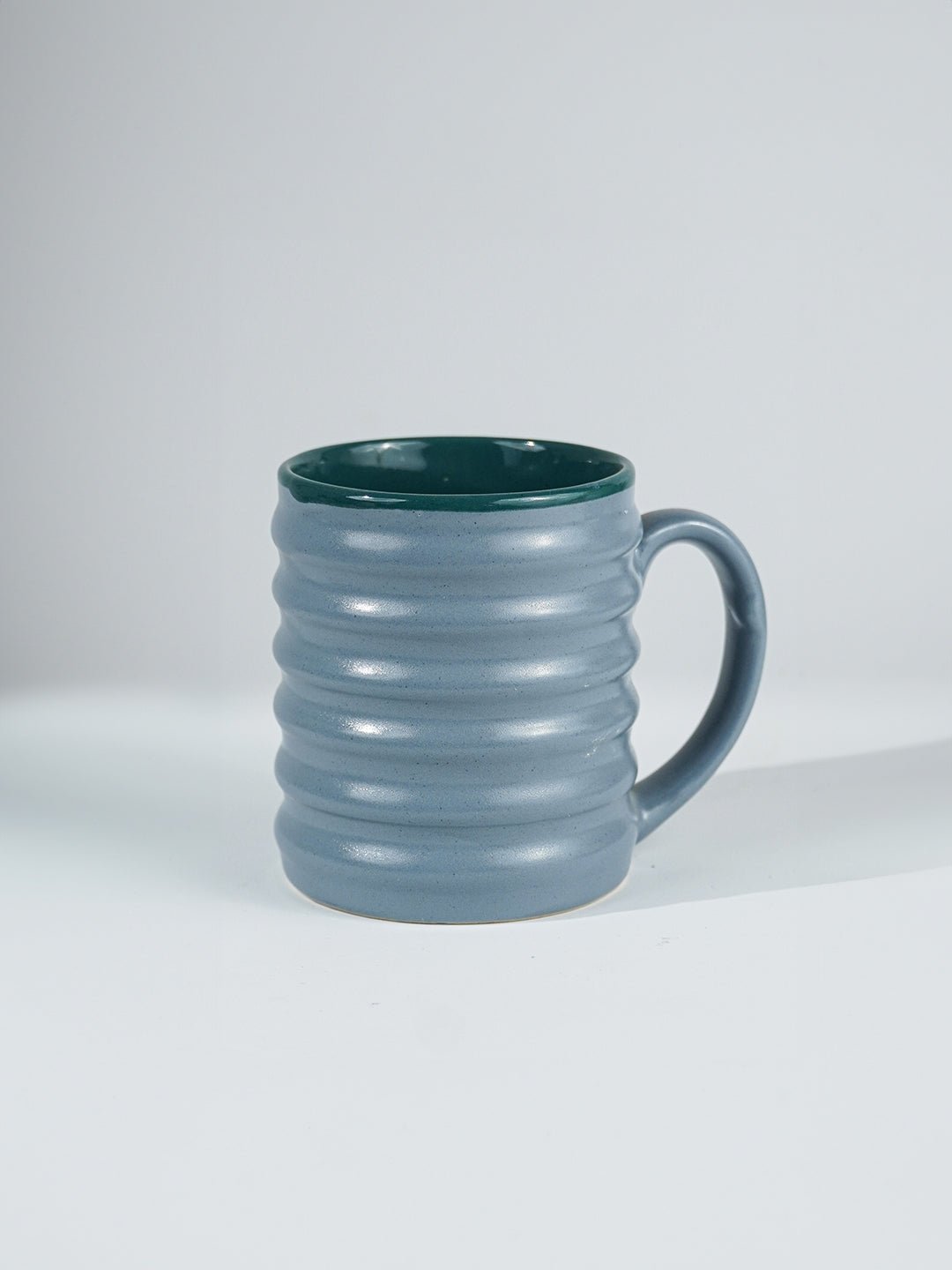 Blue Ceramic Mug with Ribbed Texture - The Golden Theory
