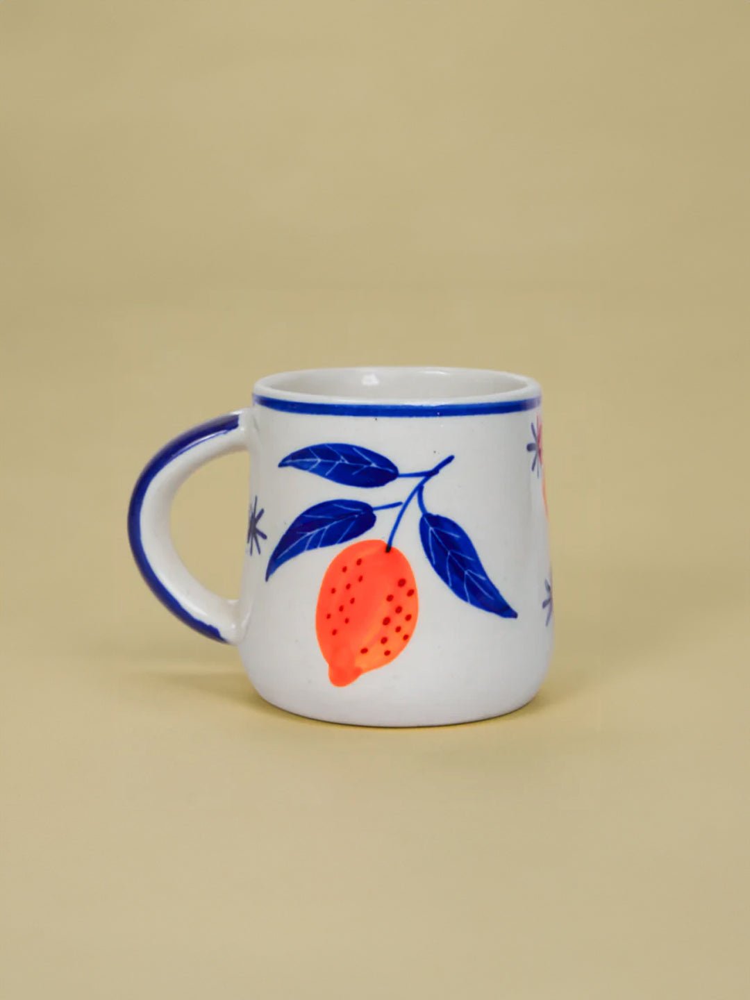 Blue & Orange Print Cup & Saucer - The Golden Theory