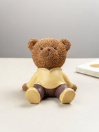 Brown Teddy Bear Figurine in Yellow Hoodie - The Golden Theory