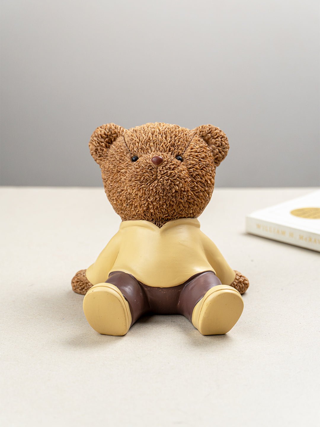 Brown Teddy Bear Figurine in Yellow Hoodie - The Golden Theory