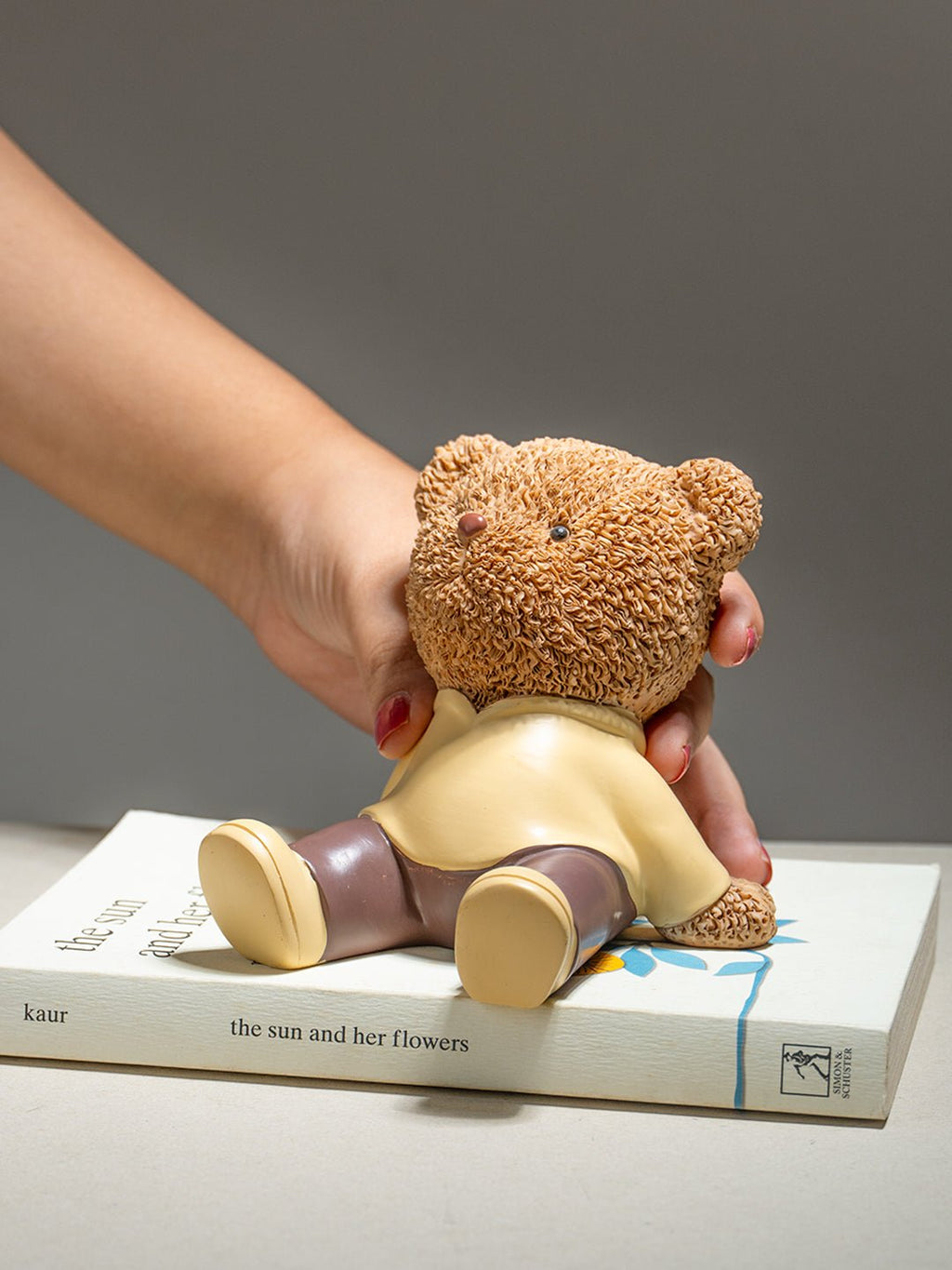 Brown Teddy Bear Figurine in Yellow Hoodie - The Golden Theory