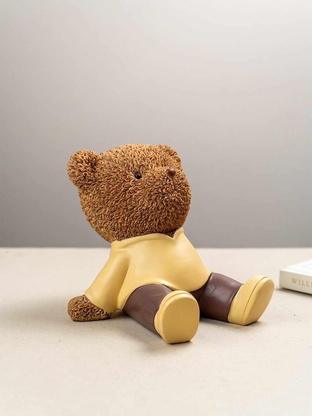 Brown Teddy Bear Figurine in Yellow Hoodie - The Golden Theory