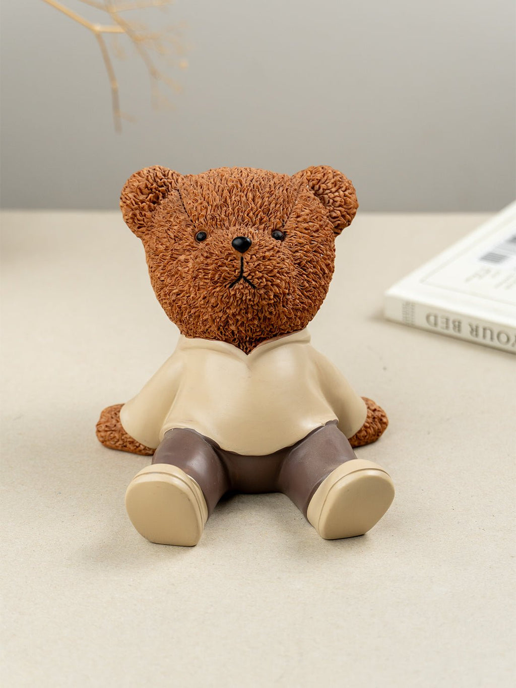 Brown Textured Teddy Bear Figurine in Yellow Shirt - The Golden Theory