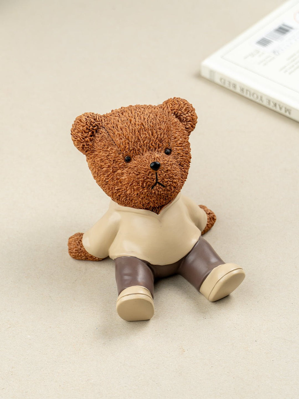 Brown Textured Teddy Bear Figurine in Yellow Shirt - The Golden Theory