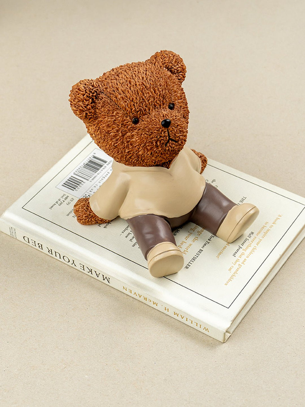 Brown Textured Teddy Bear Figurine in Yellow Shirt - The Golden Theory
