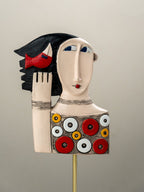 Colorful Abstract Face Sculpture with Red Bird - The Golden Theory