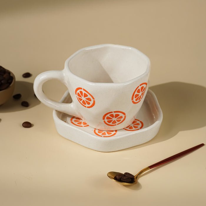 Cream Ceramic Cup with Orange Slice Motif - The Golden Theory