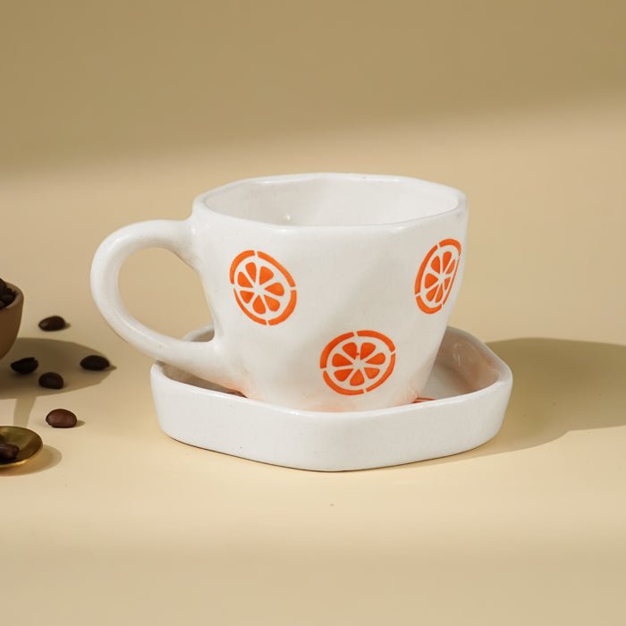 Cream Ceramic Cup with Orange Slice Motif - The Golden Theory