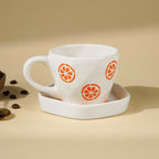 Cream Ceramic Cup with Orange Slice Motif - The Golden Theory