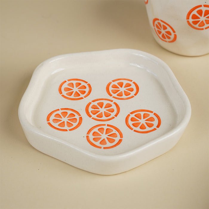 Cream Ceramic Cup with Orange Slice Motif - The Golden Theory
