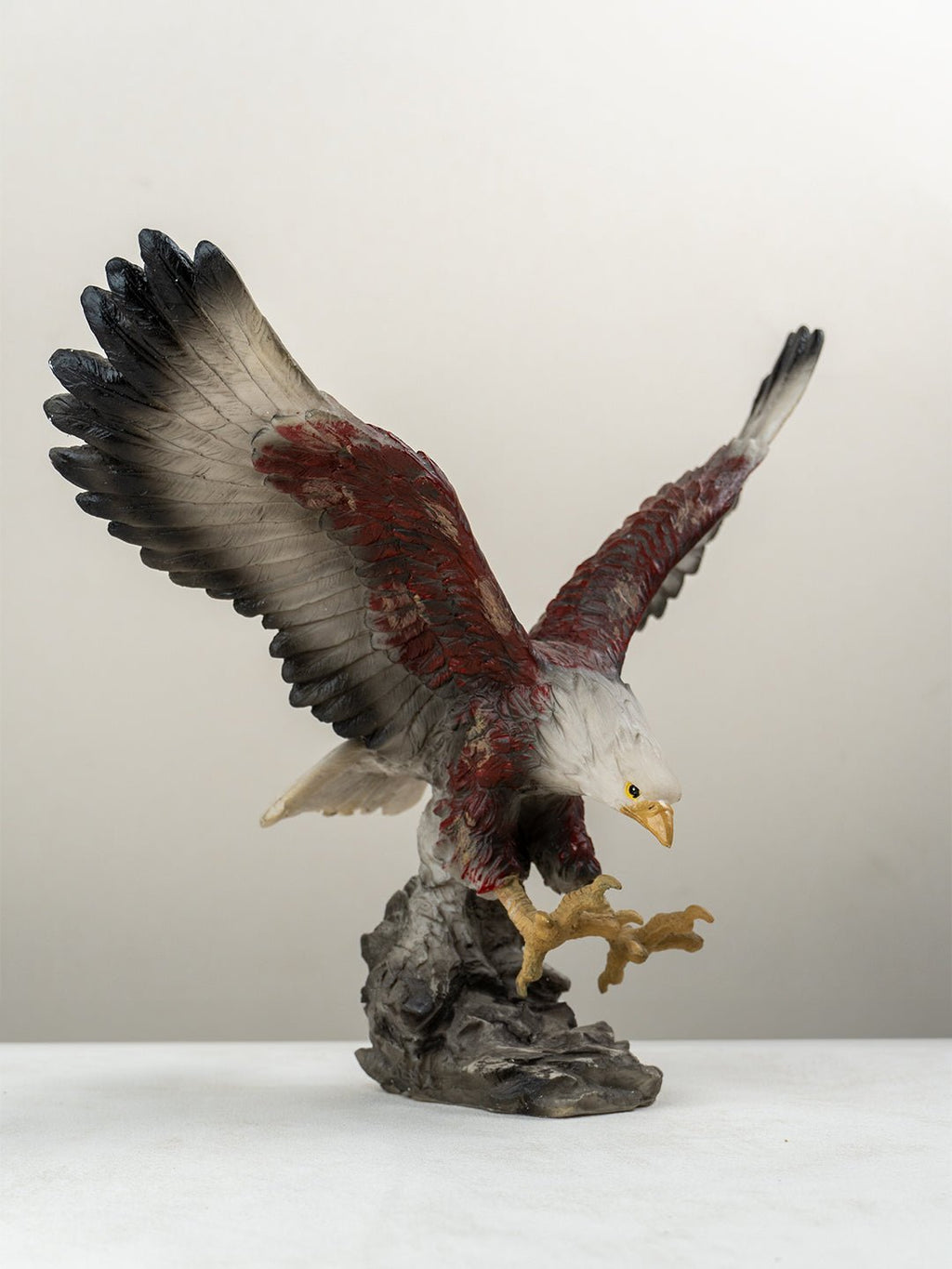 Eagle Sculpture with Red and Brown Feathers - The Golden Theory