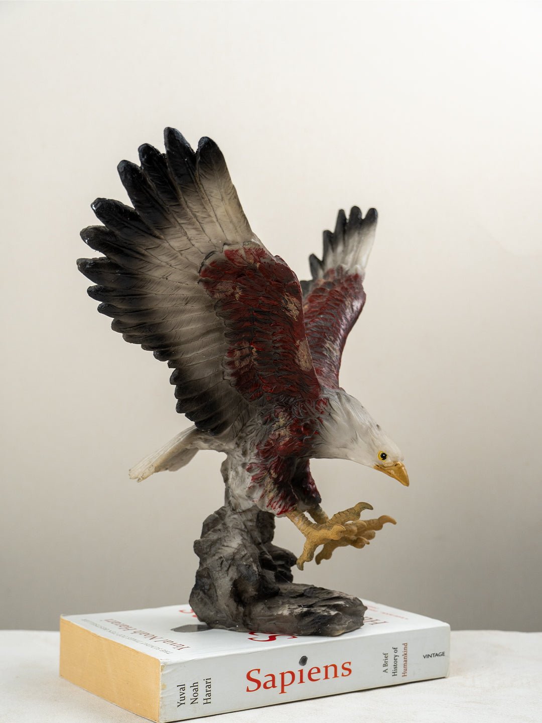 Eagle Sculpture with Red and Brown Feathers - The Golden Theory