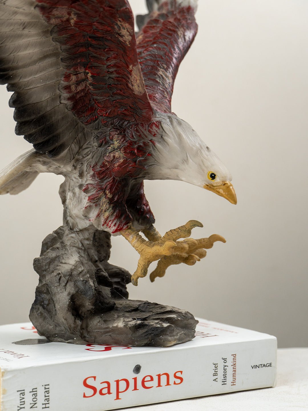 Eagle Sculpture with Red and Brown Feathers - The Golden Theory