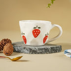 Elegant White Ceramic Cup & Saucer Set with Strawberry Print - The Golden Theory