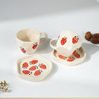 Elegant White Ceramic Cup & Saucer Set with Strawberry Print - The Golden Theory