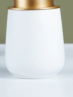 Elegant White Soap Dispenser with Gold Accents - The Golden Theory
