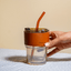 Glass Tumbler with Leather Sleeve - Orange Straw - The Golden Theory