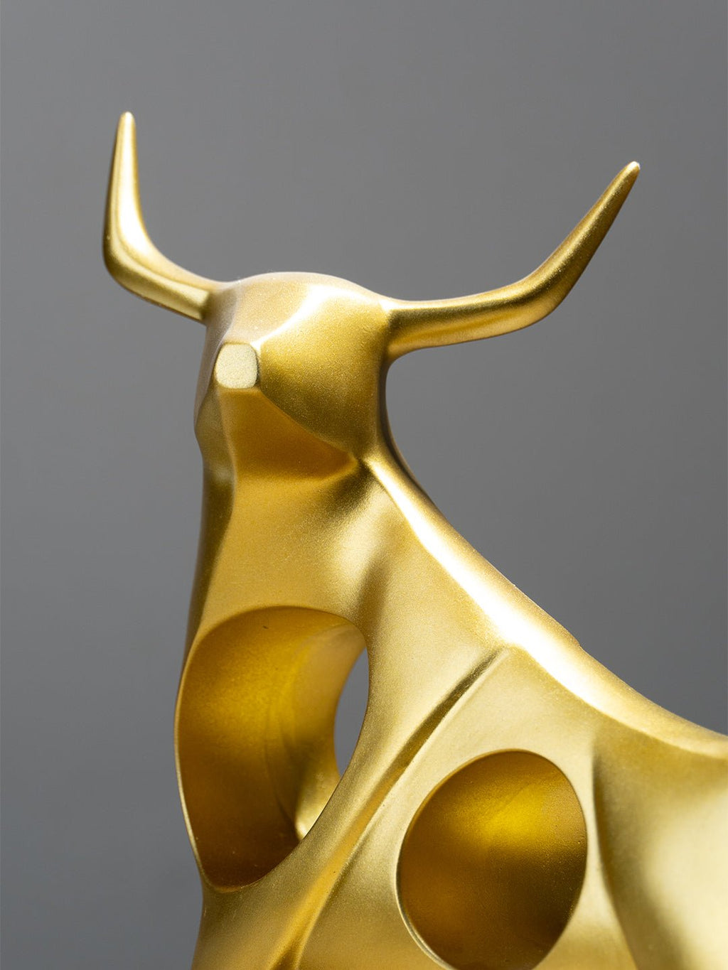 Gold Bull Sculpture with Geometric Cutouts - The Golden Theory