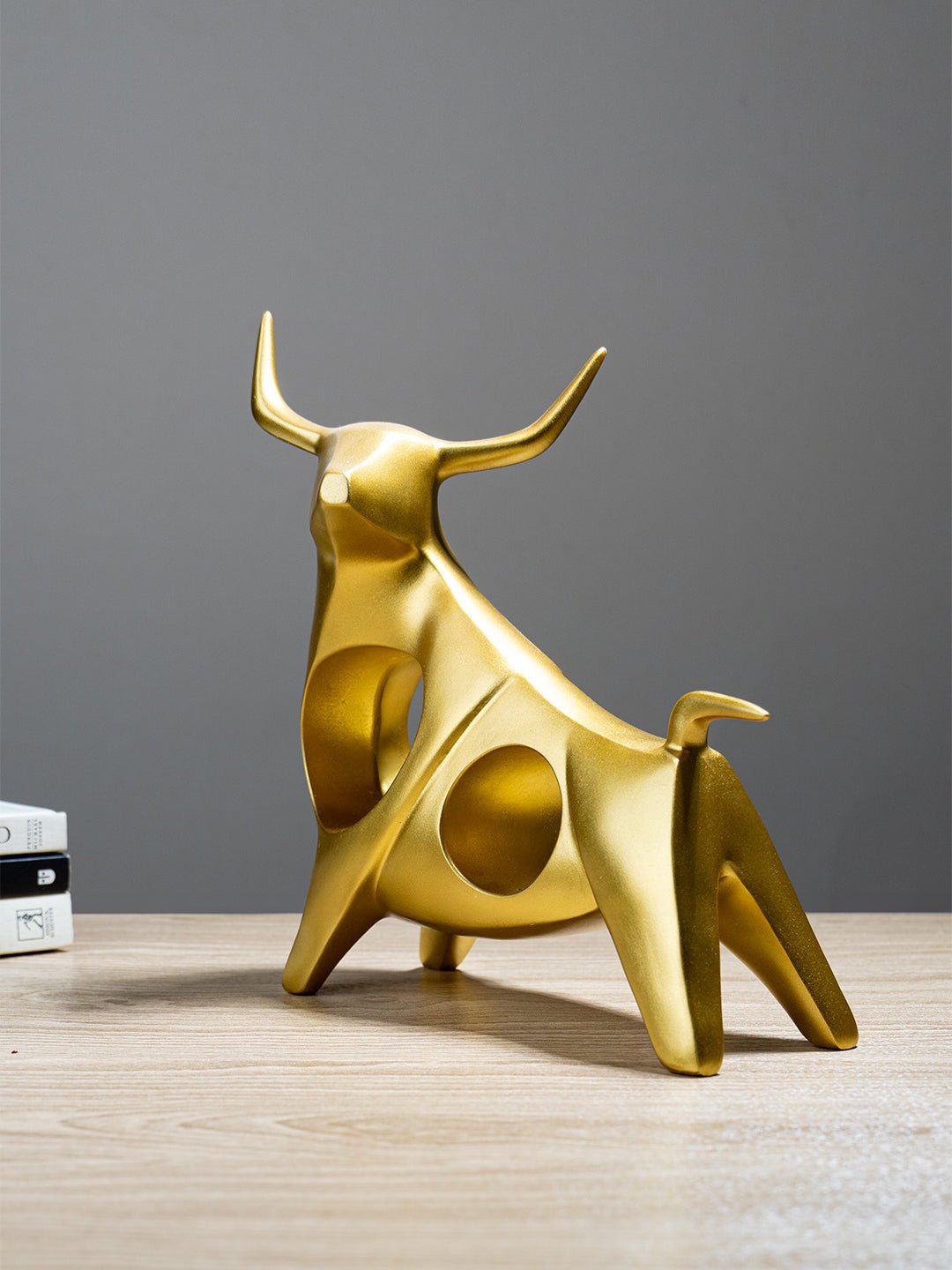 Gold Bull Sculpture with Geometric Cutouts Secondary image