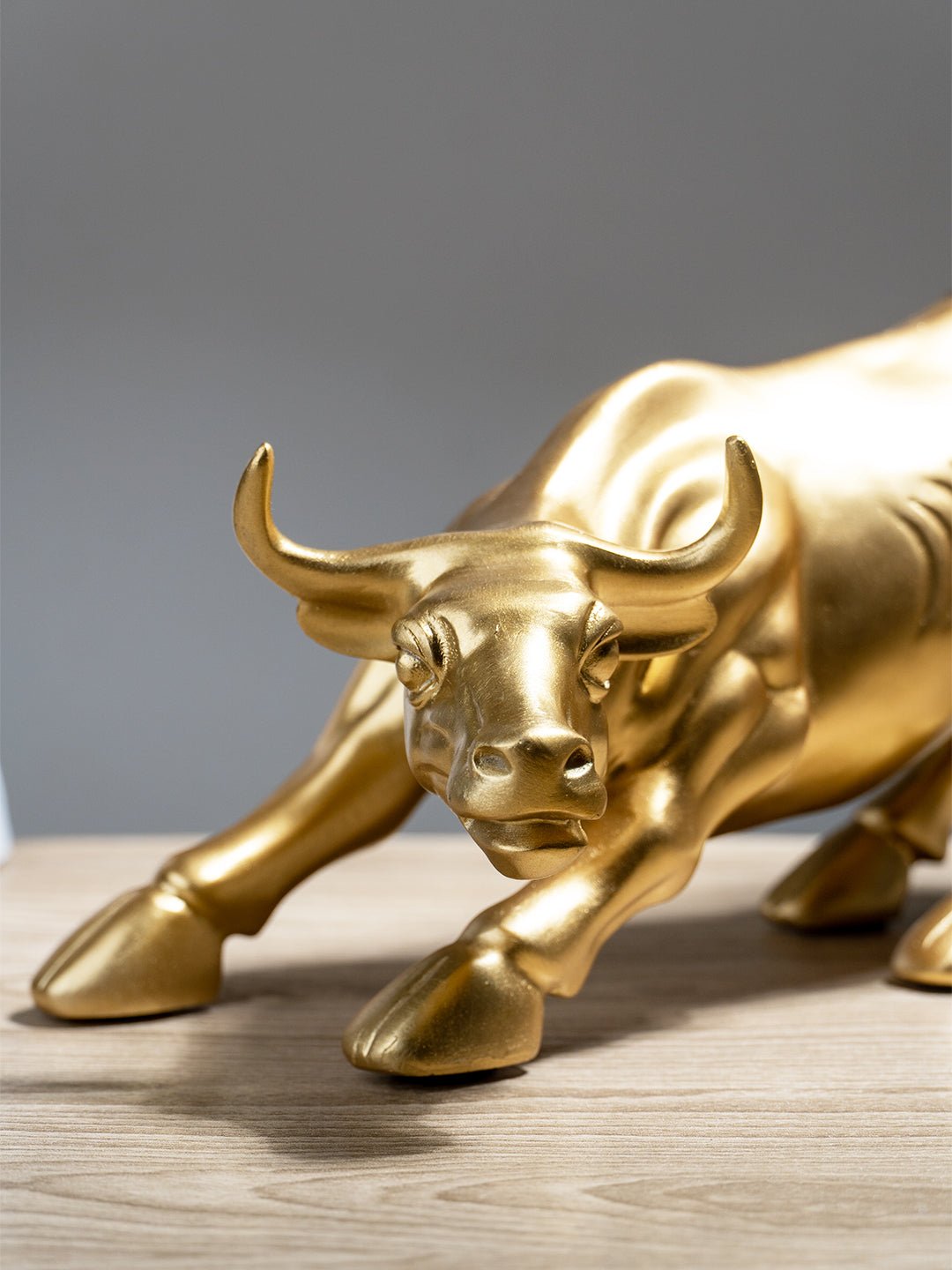 Gold Charging Bull Sculpture Secondary image