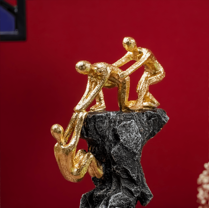 Gold-Clad Teamwork Sculpture on Granite Base Secondary image
