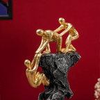 Gold-Clad Teamwork Sculpture on Granite Base - The Golden Theory