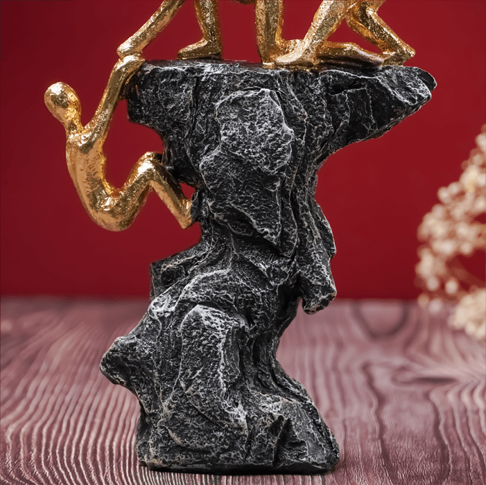 Gold-Clad Teamwork Sculpture on Granite Base - The Golden Theory