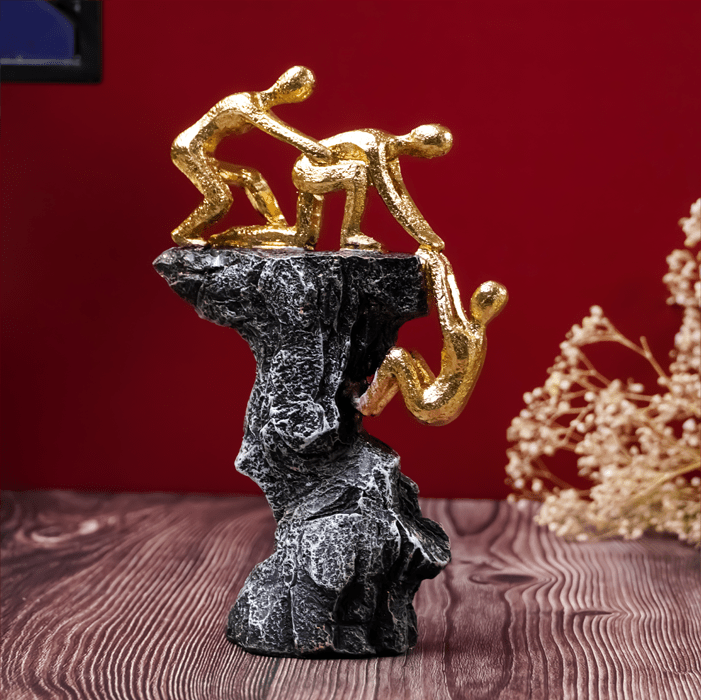 Gold-Clad Teamwork Sculpture on Granite Base - The Golden Theory