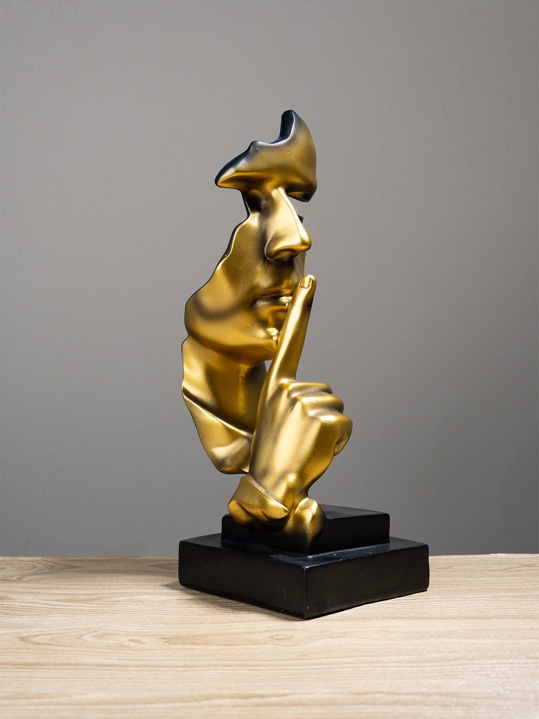 Gold Face Sculpture with Shhh Gesture - The Golden Theory