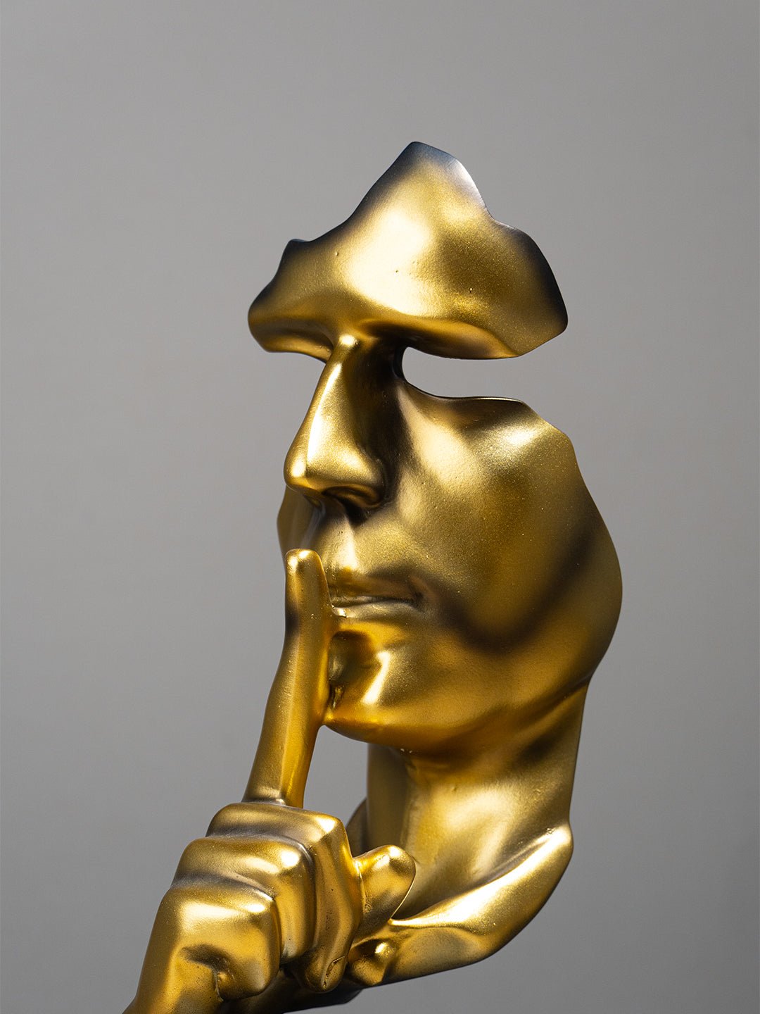 Gold Face Sculpture with Shhh Gesture - The Golden Theory
