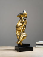 Gold Face Sculpture with Shhh Gesture - The Golden Theory