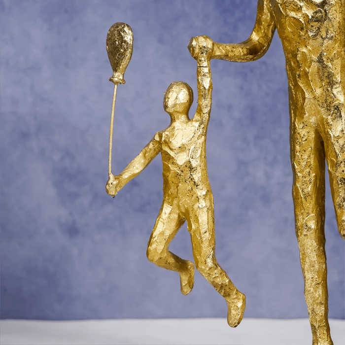 Gold Family Sculpture with Balloon - Joyful Moments in Art - The Golden Theory