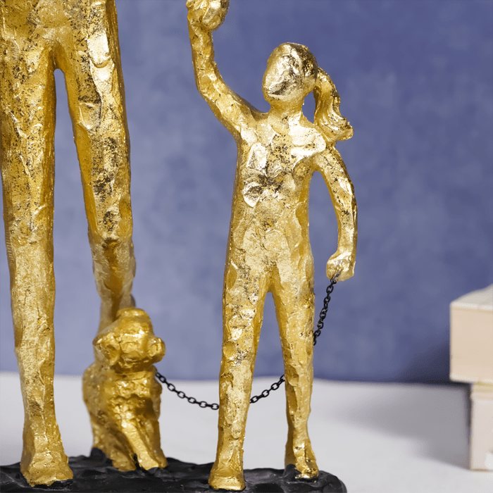 Gold Family Sculpture with Balloon - Joyful Moments in Art - The Golden Theory